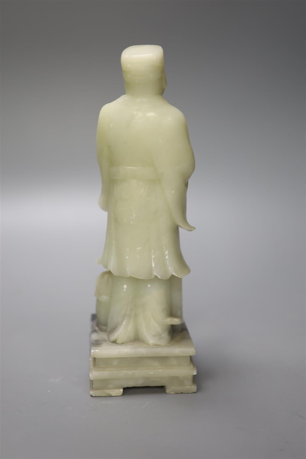 A Chinese soaptone carved figure of a sage, 25.5cm high including stand